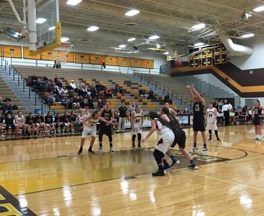 Apple Valley sophomore forward Marie Olson shoots a free throw during the first half of Tuesday's game against Farmington