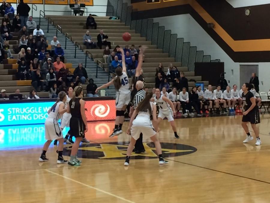 Apple Valley and Eastview go after the tip to start the game.