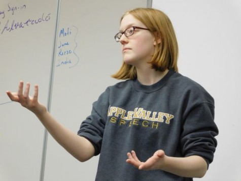 Sophomore Linneah Prehn rehearsing her creative narrative in Dr. Voss's class room