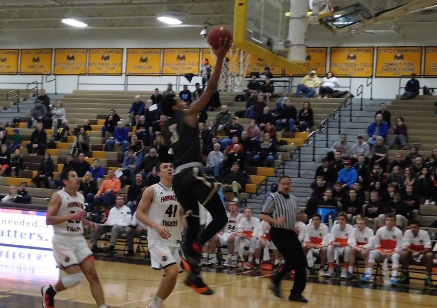 Eagles' guard Tre Jones drives to the basket after coming off the fast break