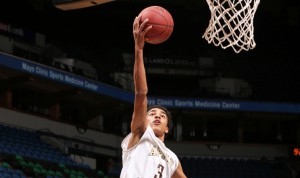 Tre lays it in for two at the Target Center.