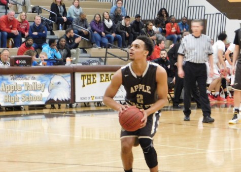 Gary Trent Jr. shoots a free throw after Henry Sibley's head coach received a technical foul.