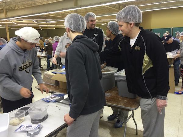 Apple Valley athletes had a little fun while they were busy packing meals