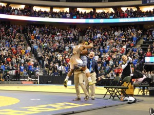 Apple Valley's Mark Hall hugs coach Jamel Tidwell after winning his sixth state title