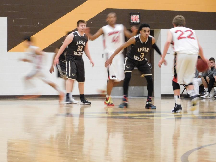 Apple Valley's Tre Jones (3) plays defense against Shakopee on Thursday night