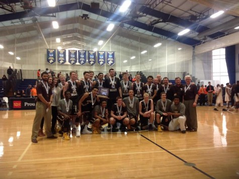 The Eagles pose for a picture with their third place trophy.