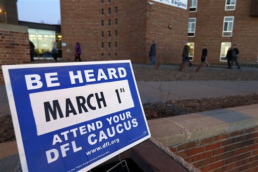 Minnesota Democratic-Farmer-Labor Party supporters head to the Democratic caucus at Bloomington Kennedy High School, Tuesday, March 1, 2016, in Bloomington, Minn. (AP Photo/Jim Mone)