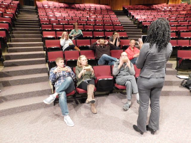 Teachers get a tutorial on using the VR glasses.