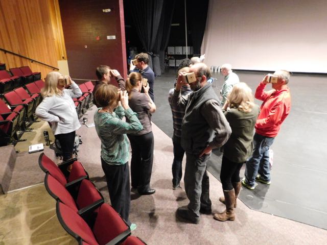 Teachers test out their VR glasses.