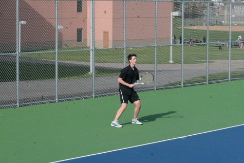 Frank Kelly playing deep near the baseline