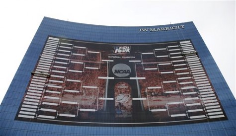 A giant bracket of last year's NCAA March Madness Tournament hung from the side of the JW Marriott in Indianapolis last year.