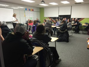 A precinct room where residents cast their presidential preference ballots and discuss additions to party platform