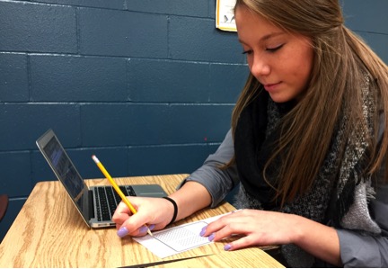 Senior Kathrine Groh takes a test in AP Calc