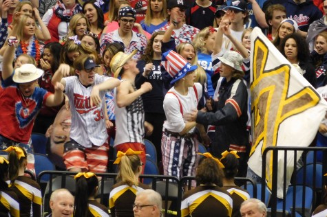 Eagle fans jump around during the first half