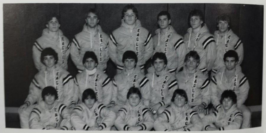 The first state championship winning 1983 wrestling team poses for their yearbook photo.