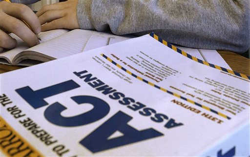 This photo shows an ACT Assessment test in Springfield, Ill. The popular ACT college admissions exam is broadening how it reports student's scores. The exam's traditional 36-point scale remains unchanged, but starting next year students will receive an ACT score on two new "readiness indicators" reflecting how they did in terms of career readiness and understanding a complex text.