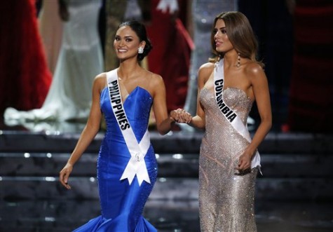 Miss Colombia Ariadna Gutierrez, right, and Miss Philippines Pia Alonzo Wurtzbach wait for the announcer to name the new Miss Universe at the Miss Universe pageant Sunday, Dec. 20, 2015, in Las Vegas.