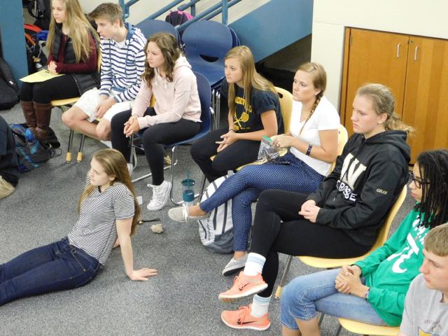 Students listen during a discussion.