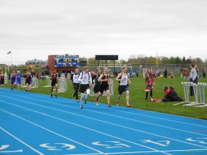 From right to left: Eagles George Knier, Patrick Erredge and Kyle Steinberg finish up the 800 meter race.