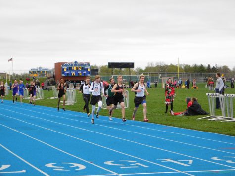 From right to left: Eagles George Knier, Patrick Erredge and Kyle Steinberg finish up the 800 meter race.