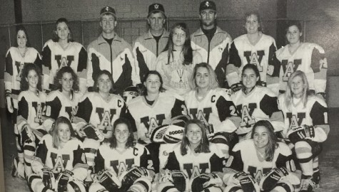 Scanlon coached the women's hockey team to two state titles, including the first women's hockey state title in the nation.