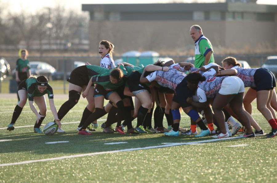 Megan Navratil, played for Eagan Sentinels rugby club, retrieving the ball from a scrum