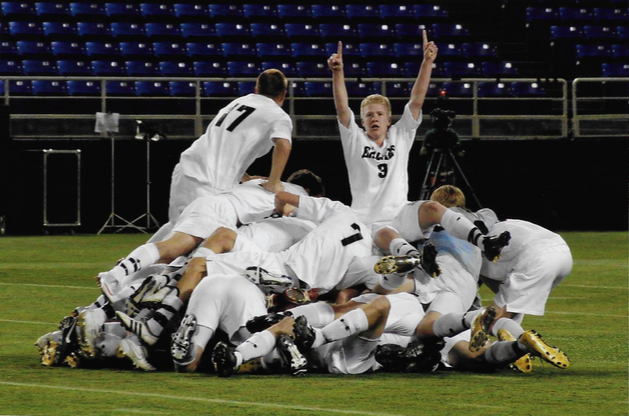 The Eagles celebrate after winning the 2009 soccer state title.