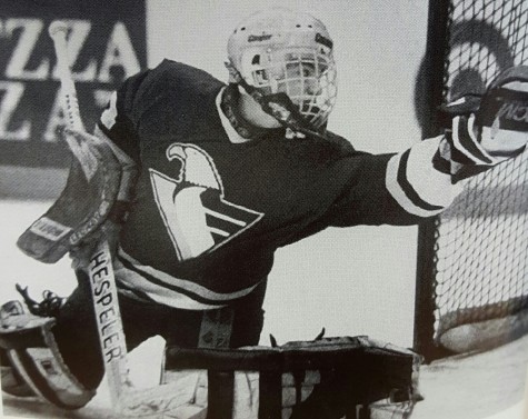 Apple Valley goaltender Karl Goehring makes a glove save in a state tournament game (Photo via Apple Valley yearbook)