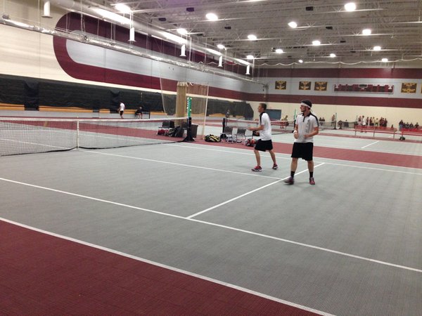 A match at an Apple Valley home tennis event.