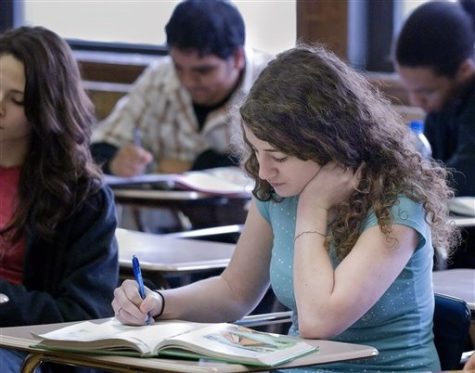 Amanda Gross, an 18-year-old senior and one of the original HOPE scholars, studies in her Spanish language at Eastern High School Monday Feb. 4, 2008 in Lansing, Mich. Gross will graduate at or near the top of her Lansing Eastern High School class this spring and plans to attend Michigan State University to study science. (AP Photo/Kevin W. Fowler)