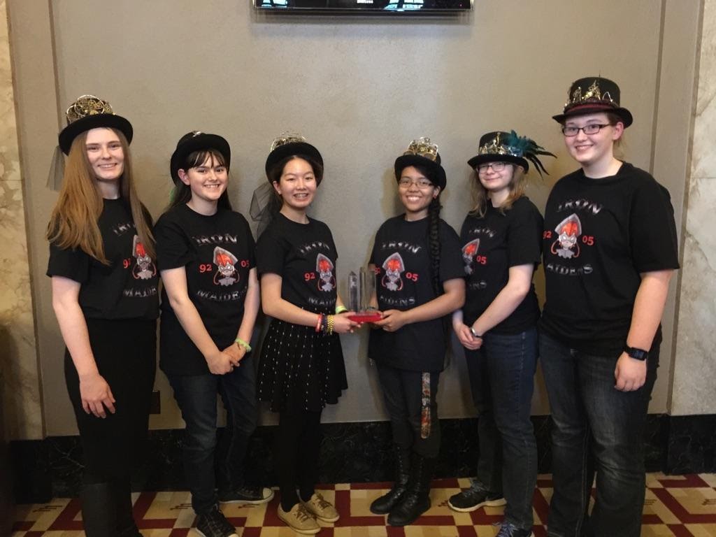 (From left to right) Cori Roberts, Emily DeBoard, Barbara Tan, Marie Pena, Connie Knipe, and Atalanta Stoeke hold their trophy after winning first place at the robotics World Championship