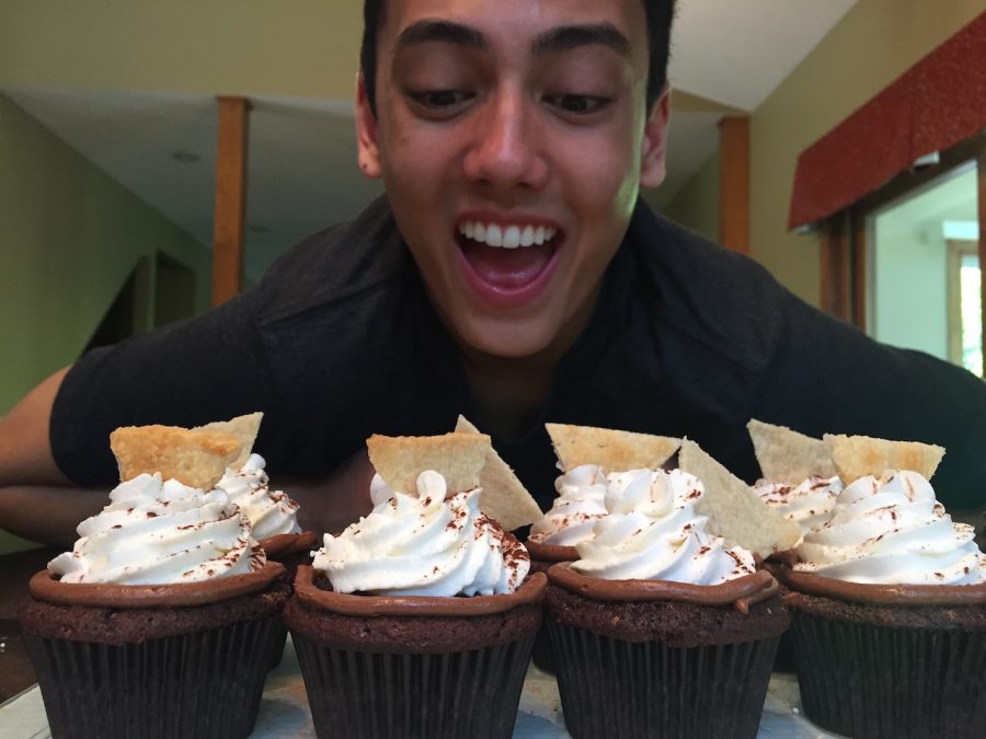 Ethan with a batch of his famous cupcakes.