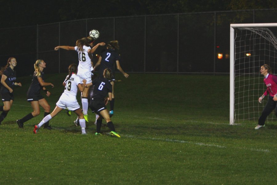 #16 Olivia Feilen goes up for a header and scores the game-winning goal against Eastview.