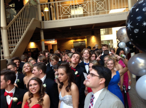 Prom-goers waiting in line to walk the Grand March.