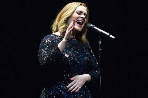 Adele performs at the O2 Arena.