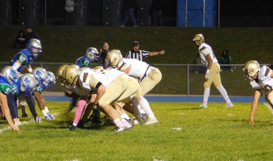 Noah Sanders lines up under center getting ready to lead the offense.