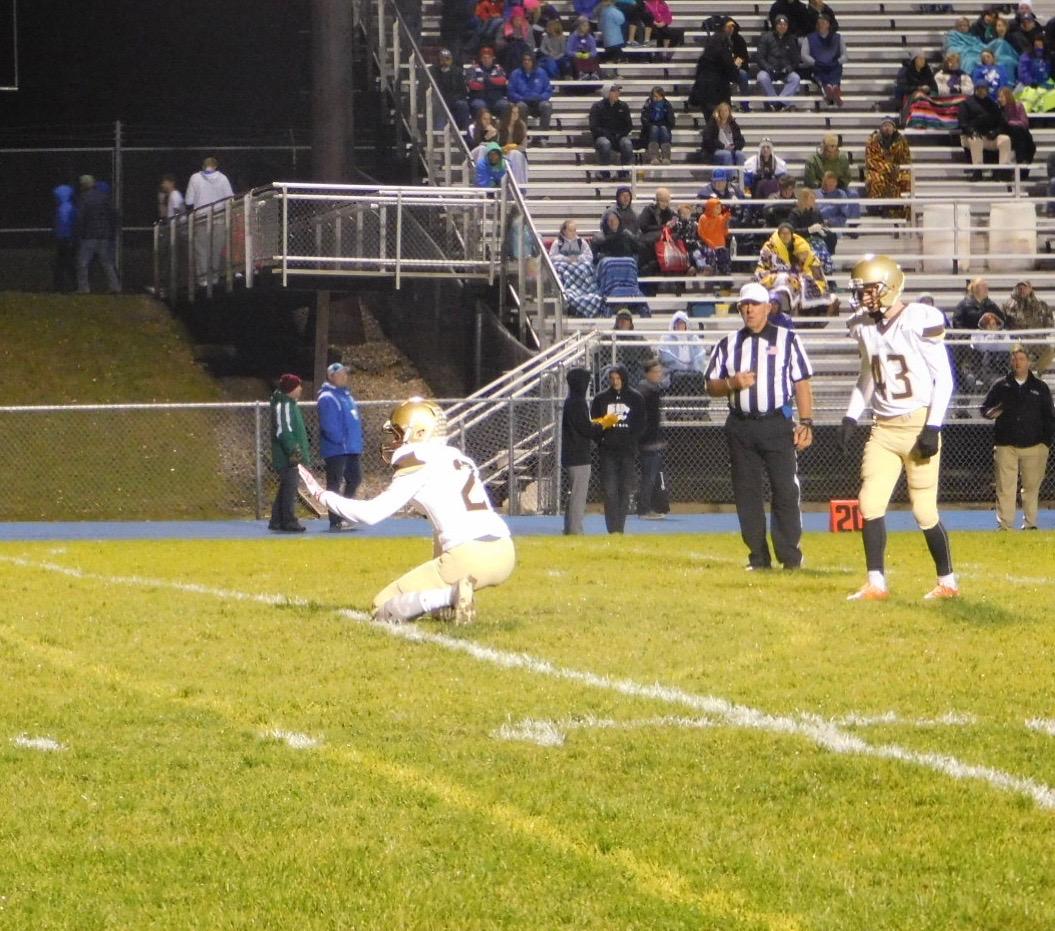 Ewald and holder Jake Ertz lining up for an extra point.