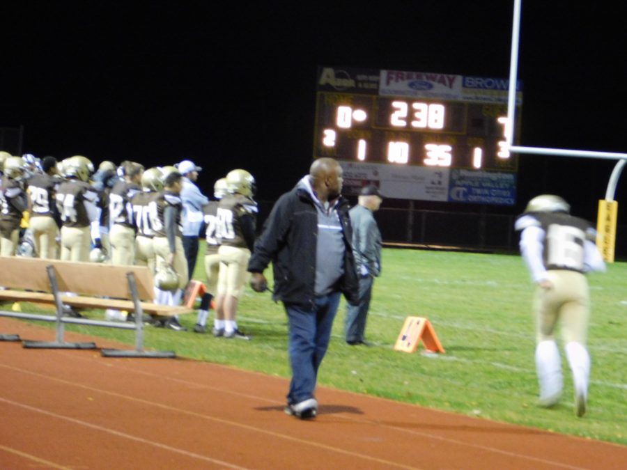 Athletic director Virgil Jones patrols the sidelines.