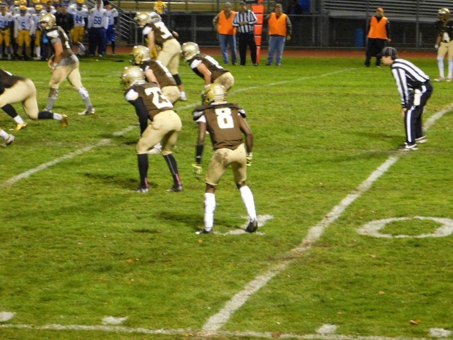 Marcus Hosea (8) and the Eagles defense prepare to stop Hastings.