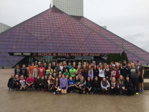 The marching band in front of the Rock and Roll Hall of Fame and Museum.