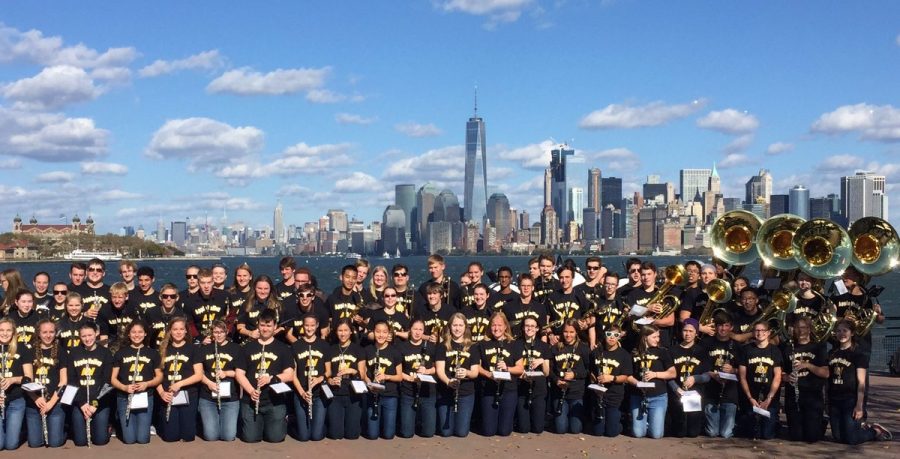 On Liberty Island, the band performed next to the Statue of Liberty with the NYC skyline behind them.