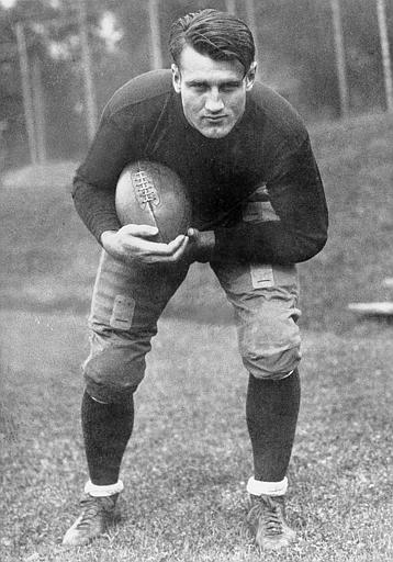 This is an undated photo of Bronislaw "Bronko" Nagurski, University of Minnesota tackle and consensus All-American 1929, in an action pose at an unknown location.  Nagurski  also played in 1930-1937 and 1943 for the Chicago Bears at fullback.  (AP Photo)