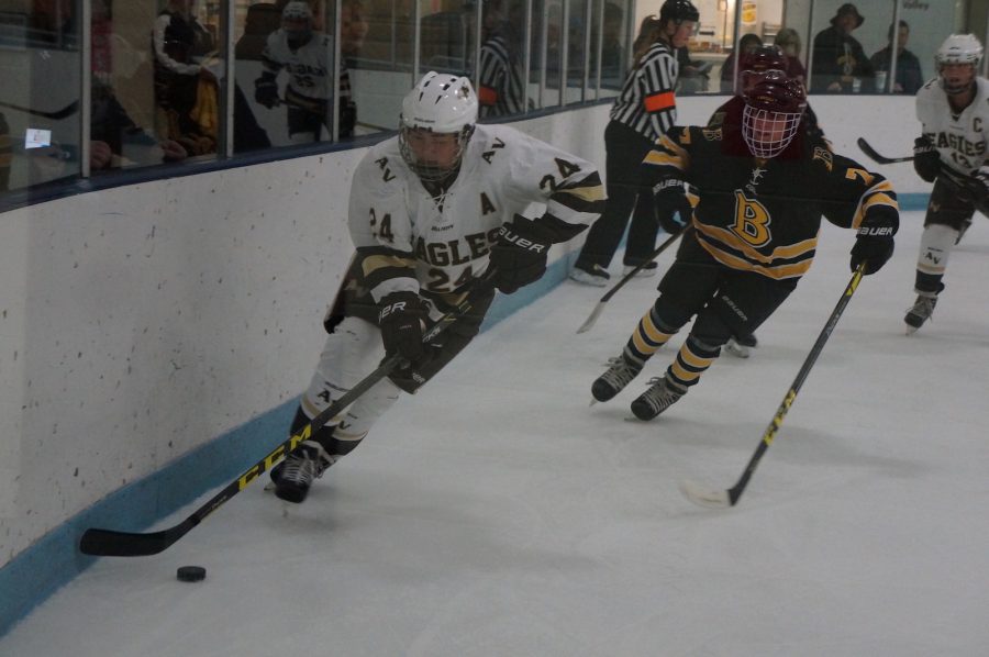 Senior Lexi Kocken skates along the boards.