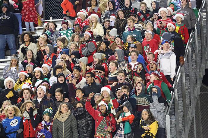 The student section cheers on the Eagles