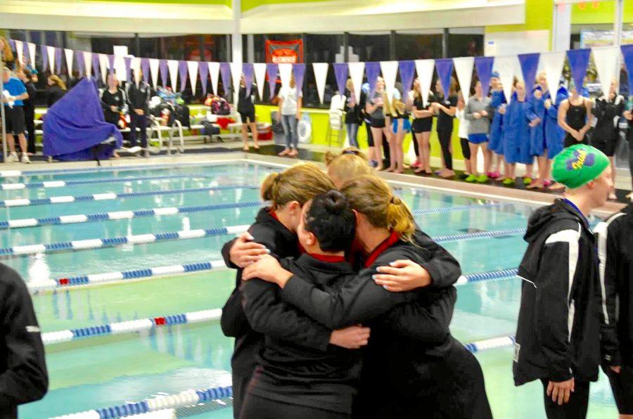 At sections, the relay team celebrates their advance to state