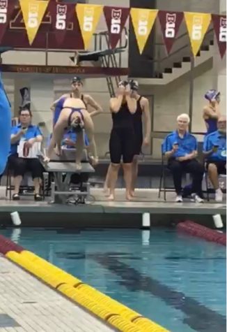 Vivien Duong prepares to dive off the block