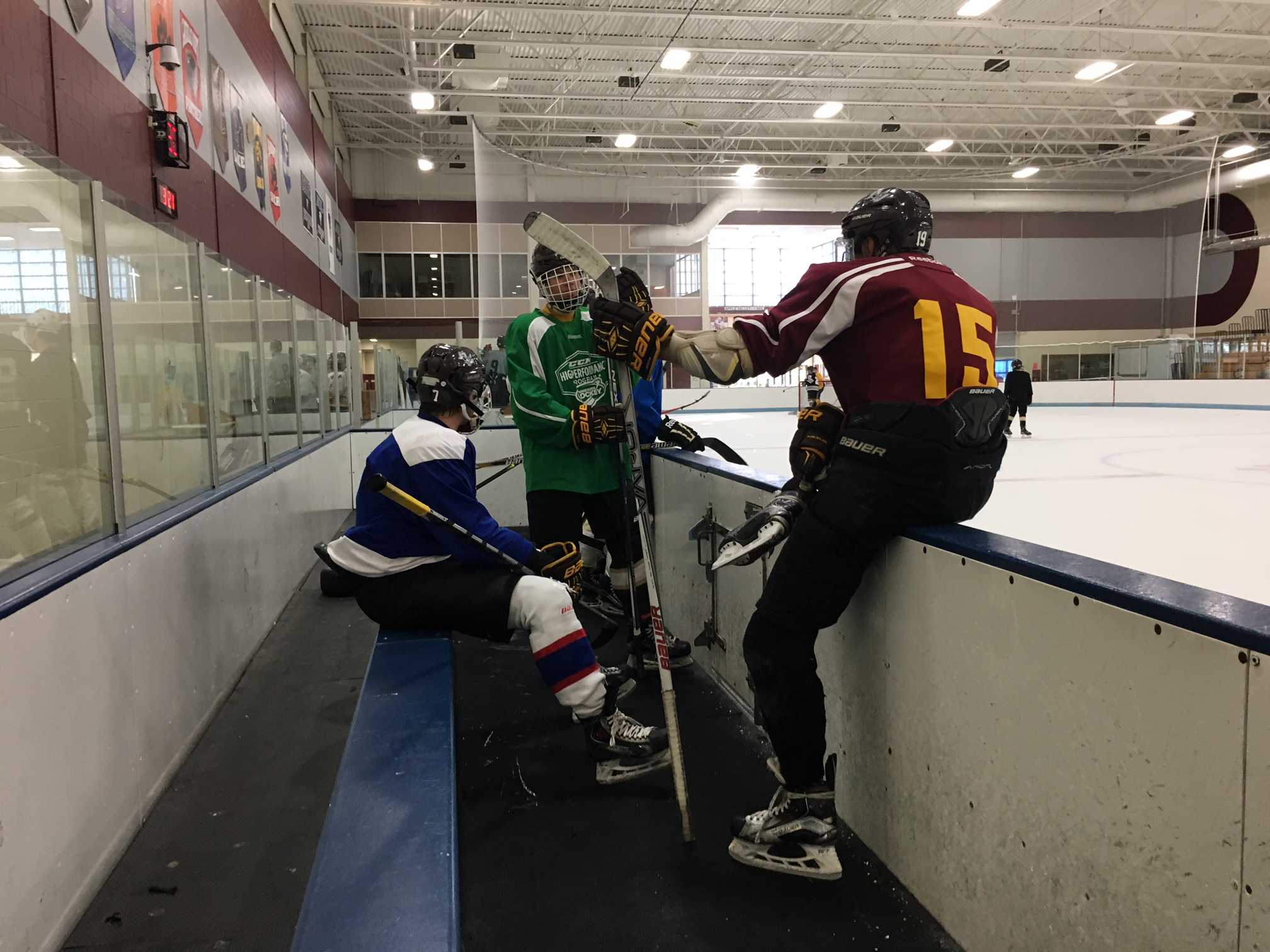 Players talk during a break in practice.