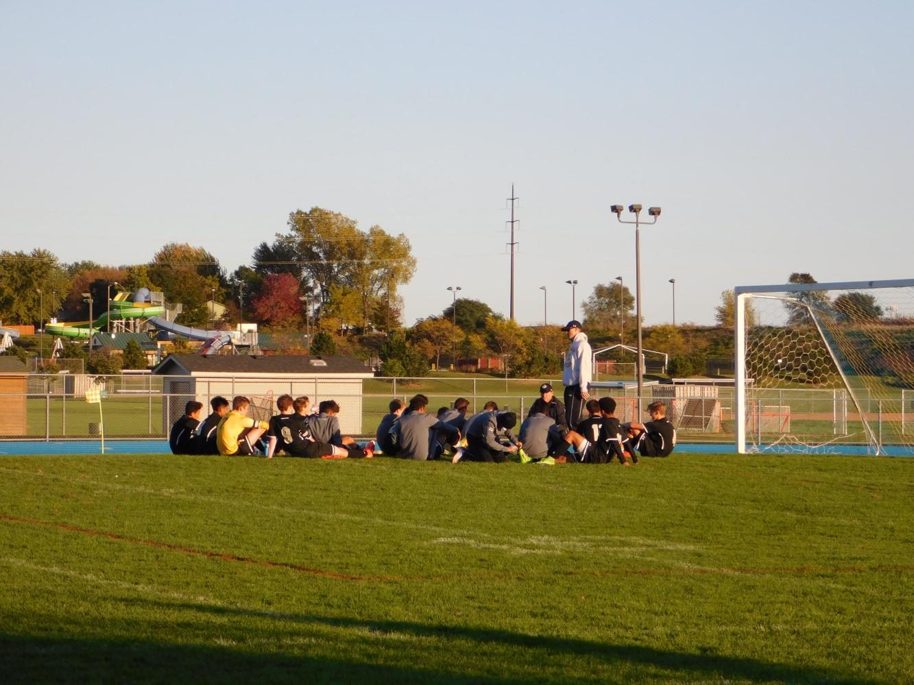 The team soaks in the sun and the play plans.