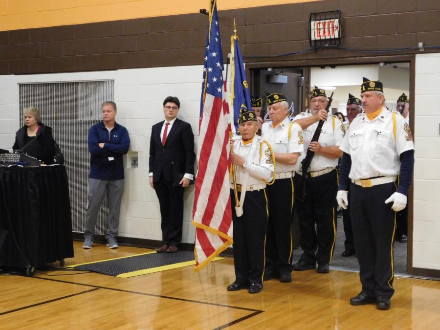 American Legion Post 1776 performs the Posting of the Colors.