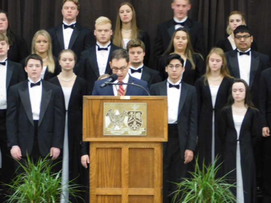 Principal Michael Bolsoni welcomes Valley Select Chorale.